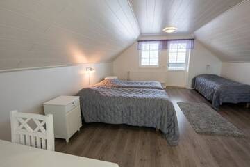 Фото номера Коттедж с сауной и 4 спальнями Дома для отпуска Kajaani Cottages г. Jormua 21