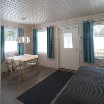 Фото номера Коттедж с сауной Дома для отпуска Kajaani Cottages г. Jormua 2