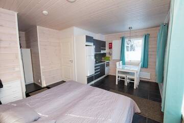 Фото номера Коттедж с сауной Дома для отпуска Kajaani Cottages г. Jormua 5