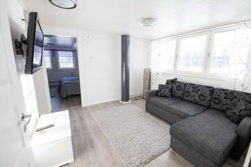 Фото номера Коттедж с сауной и 4 спальнями Дома для отпуска Kajaani Cottages г. Jormua 8