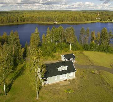 Фото номера Коттедж с сауной и 4 спальнями Дома для отпуска Kajaani Cottages г. Jormua 11