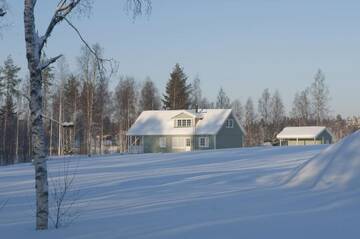 Фото номера Коттедж с сауной и 4 спальнями Дома для отпуска Kajaani Cottages г. Jormua 10